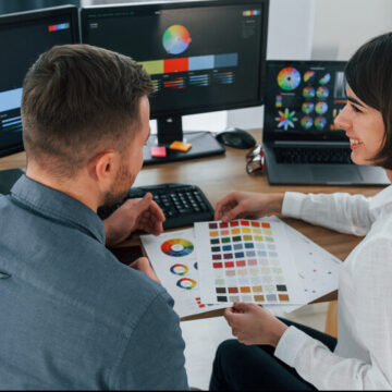 top-view-two-designers-working-together-in-the-of-2023-11-27-04-51-18-utc