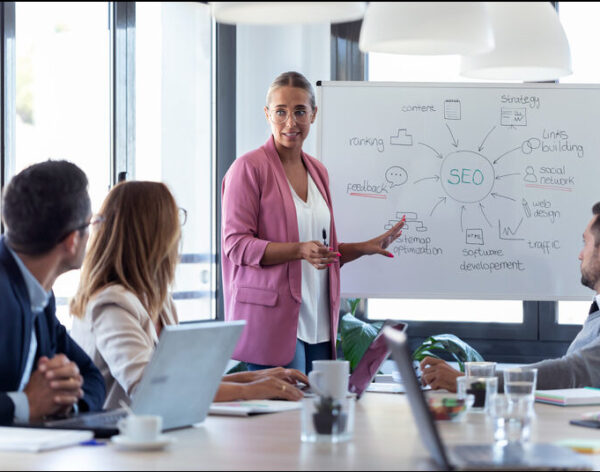 young-businesswoman-pointing-at-white-blackboard-a-2024-09-17-21-21-49-utc